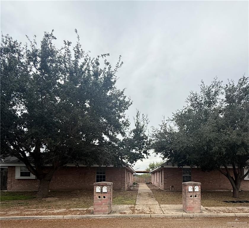 1213 Mineral Rights Lane, Unit 4 Edinburg, TX 78541 - Photo 1 of 10 a view of a house with a tree