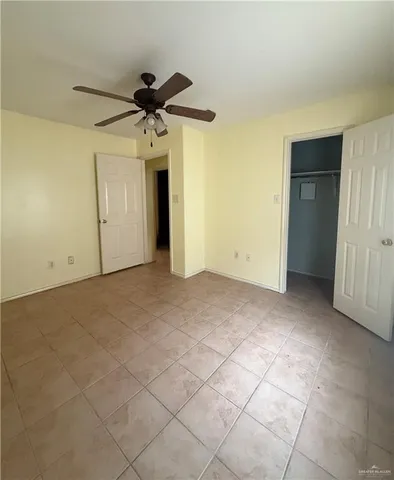 a view of a livingroom with a ceiling fan