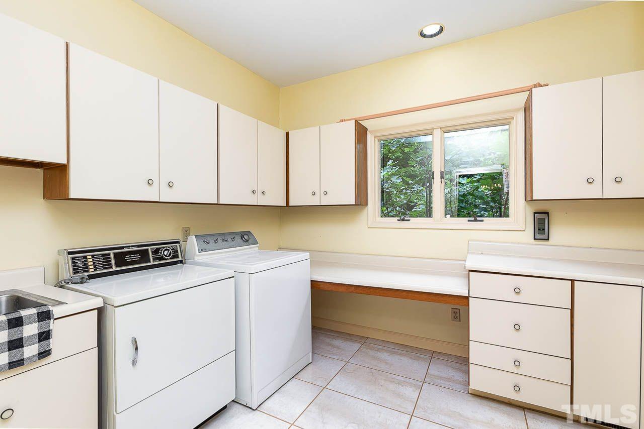 212 Carpathian Way Raleigh, NC 27615 - Photo 24 of 24 a view of cabinets and window