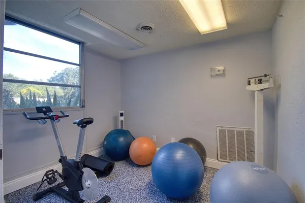 a room with furniture and a window