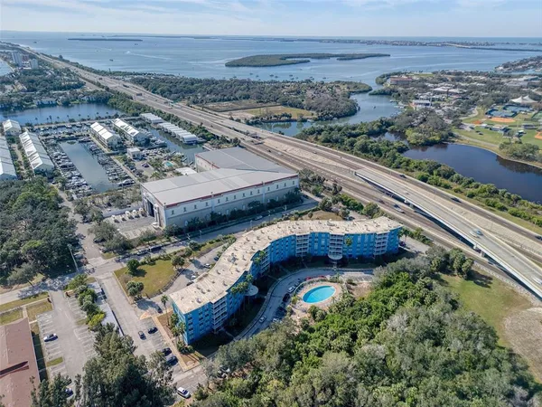 an aerial view of a house with a yard