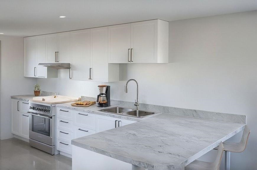 742 King Road Memphis, TN 38109 - Photo 3 of 3 a view of a kitchen with a sink and cabinets