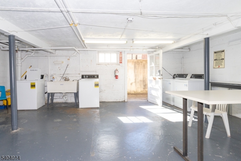 445 Morris Avenue Springfield, NJ 07081 - Photo 14 of 15 a view of a kitchen with furniture and a kitchen
