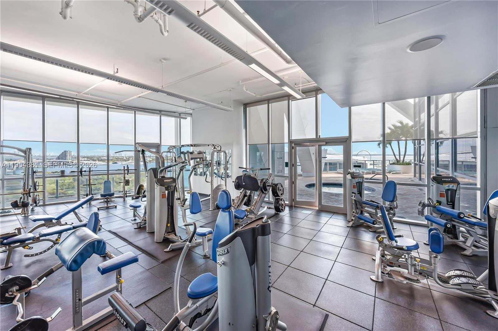 888 Biscayne Boulevard, Unit 2009 Miami, FL 33132 - Photo 15 of 21 a view of a room with gym equipment