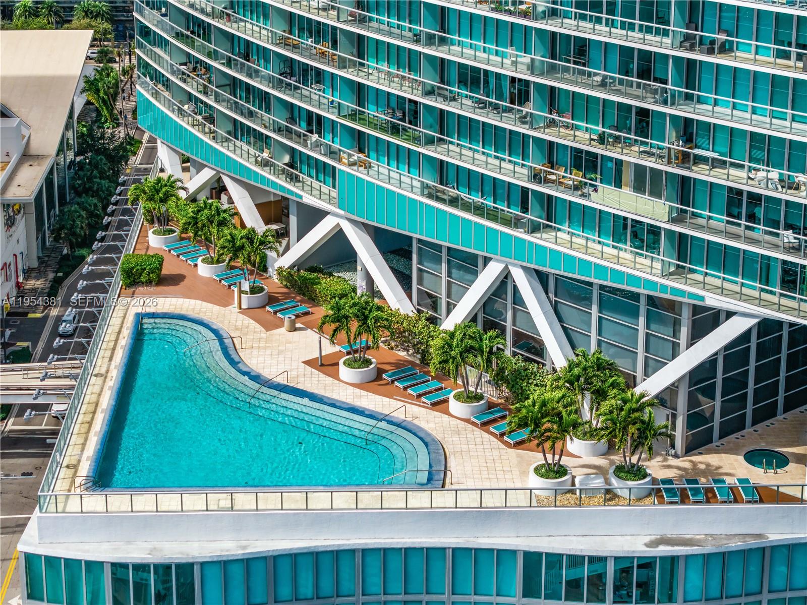 888 Biscayne Boulevard, Unit 2009 Miami, FL 33132 - Photo 19 of 21 a view of outdoor space swimming pool and deck