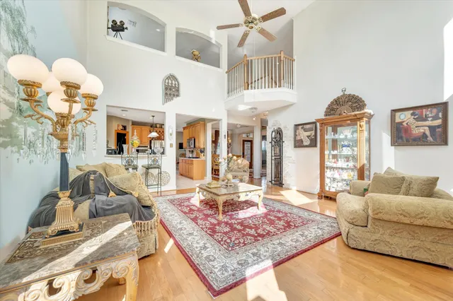 a living room with furniture and a rug