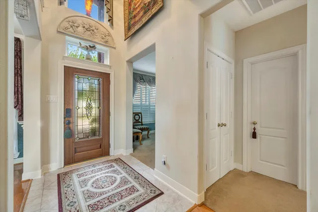 a view of an entryway with a rug