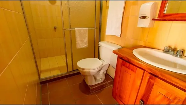 a view of kitchen with furniture and floor to ceiling window