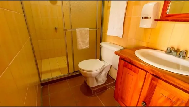 a view of kitchen with furniture and floor to ceiling window