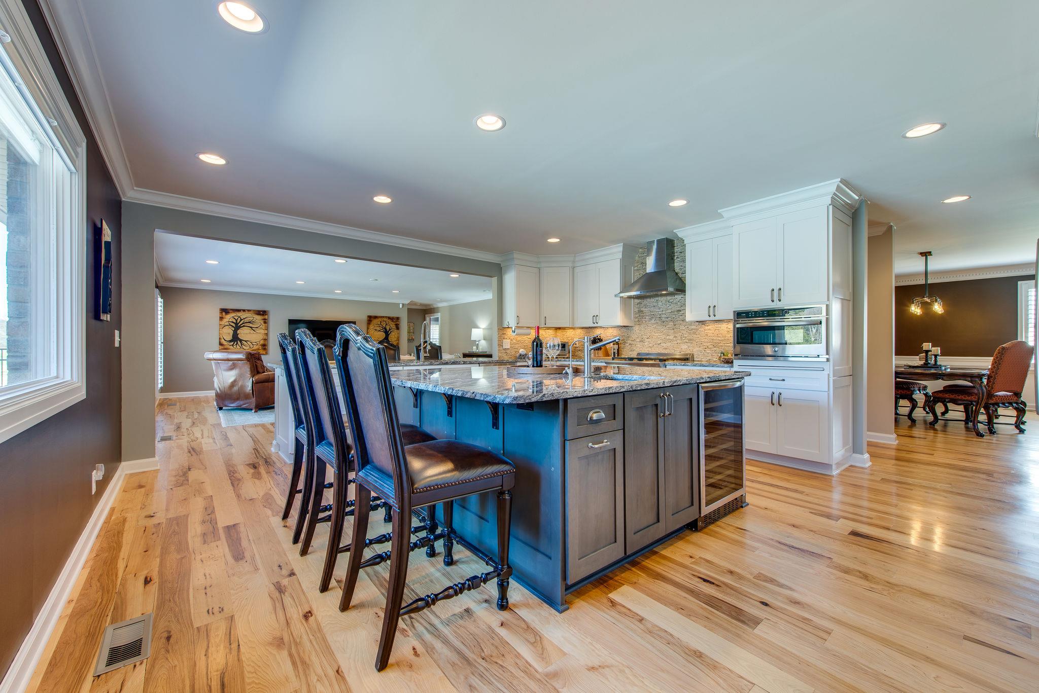 2164 Kidd Road Nolensville, TN 37135 - Photo 6 of 26 A cheerful entry; Stunning wide plank "Sand and Finish" hickory floors throughout the house.