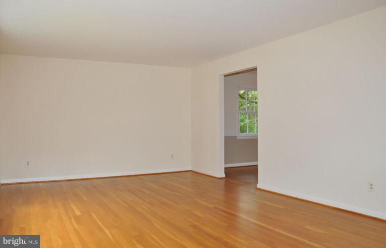 5316 Waneta Road Bethesda, MD 20816 - Photo 9 of 29 Living room with entrance into dining room.