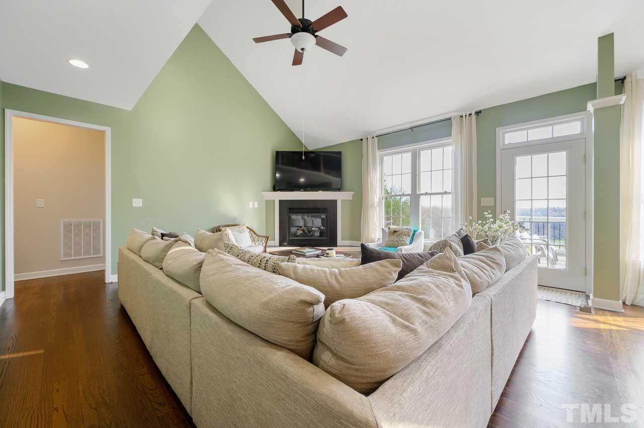 7001 New Sharon Church Road Rougemont, NC 27572 - Photo 15 of 52 a living room with furniture window and a fireplace