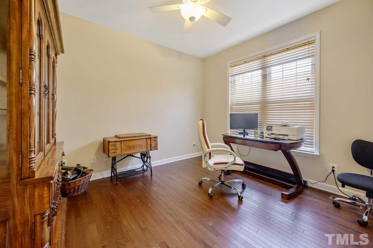 7001 New Sharon Church Road Rougemont, NC 27572 - Photo 25 of 52 a view of a workspace with furniture and a window