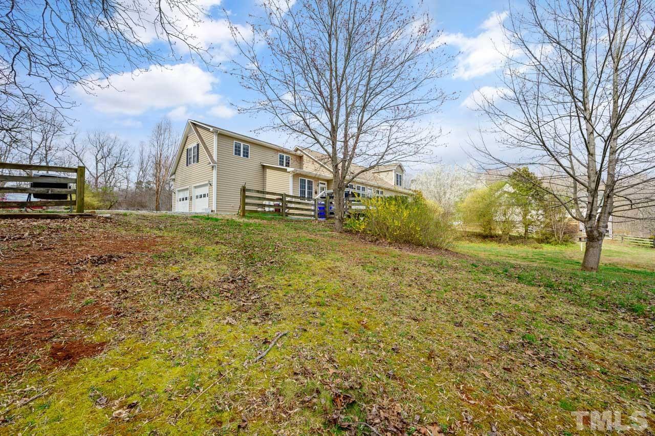 7001 New Sharon Church Road Rougemont, NC 27572 - Photo 47 of 52 a view of a yard with a large tree