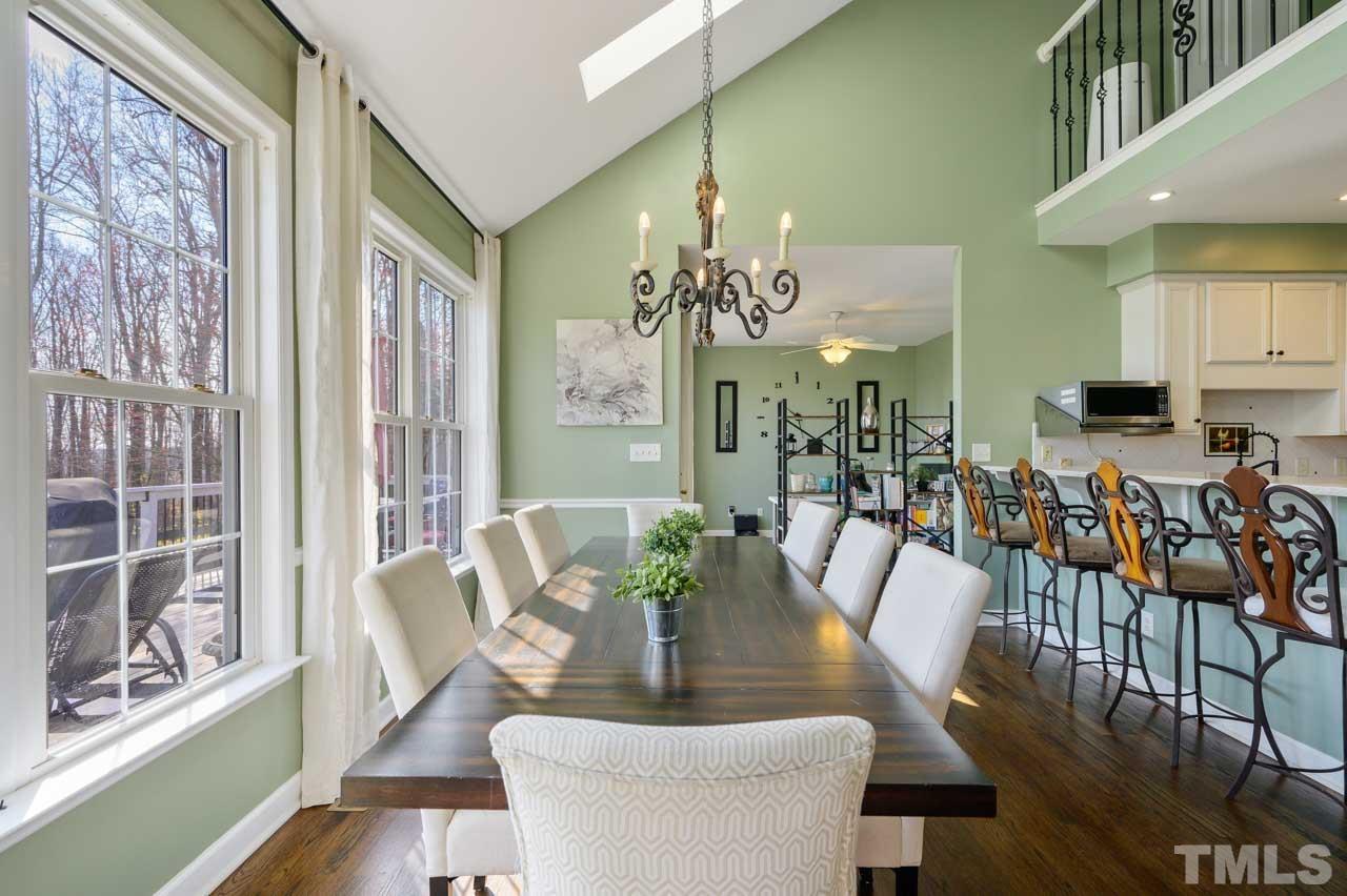 7001 New Sharon Church Road Rougemont, NC 27572 - Photo 10 of 52 a view of a dining room with furniture window and wooden floor