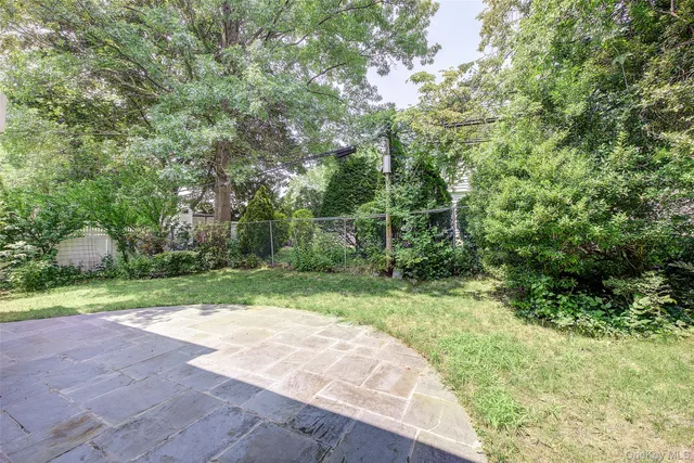 a view of backyard with green space