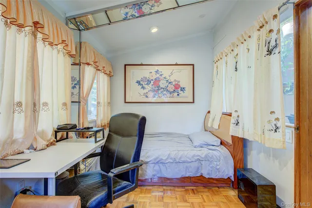 a bedroom with a bed and furniture