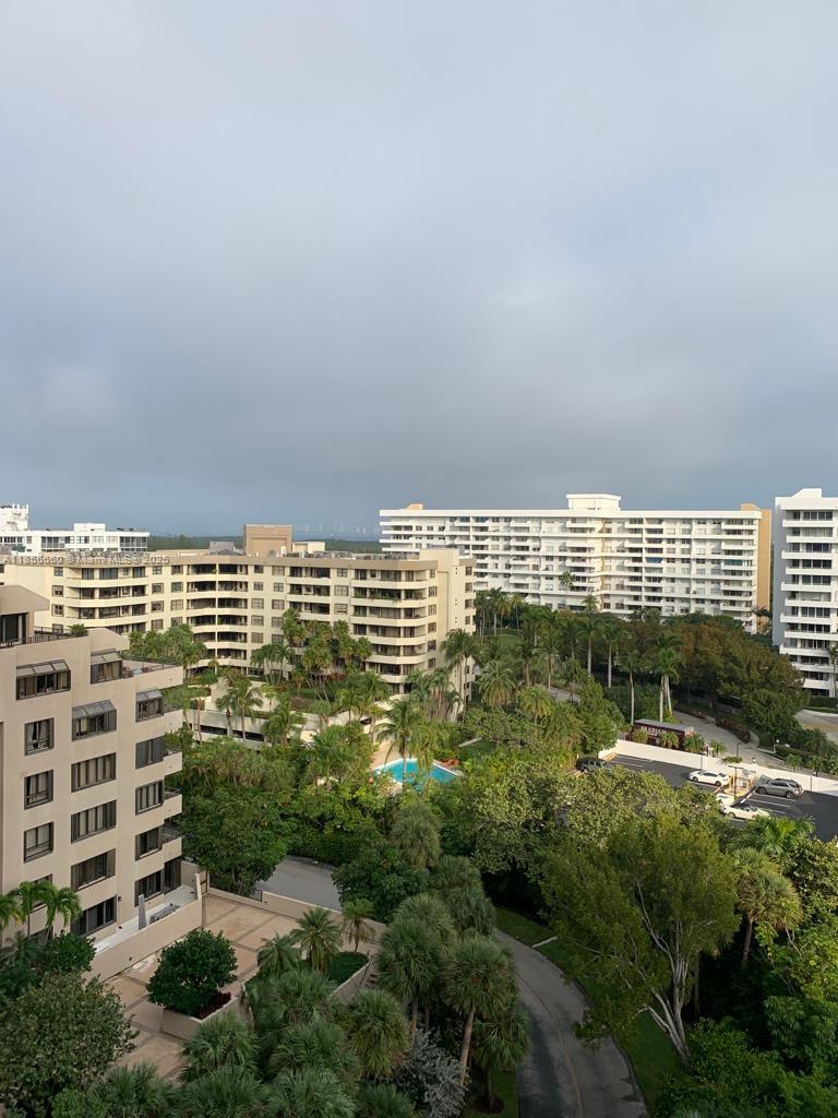 251 Crandon Boulevard, Unit 929 Key Biscayne, FL 33149 - Photo 1 of 26 a view of building with outdoor space