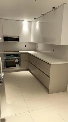 a utility room with cabinets