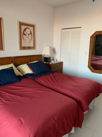 a bathroom with a toilet and a vanity