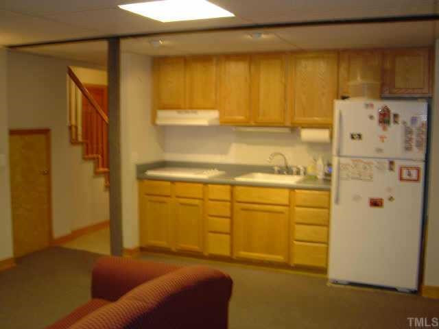 1923 Myron Drive Raleigh, NC 27607 - Photo 9 of 10 Basement bonus room with its own kitchenette and full bath is great space for playroom, in-law or au pair suite! Other