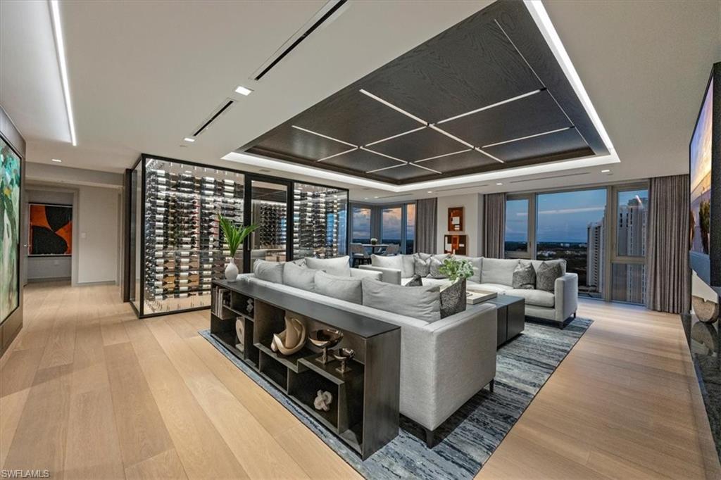 6897 Grenadier Boulevard, Unit 1701 Naples, FL 34108 - Photo 14 of 50 a very nice looking room with a large window