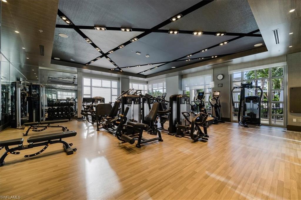 6897 Grenadier Boulevard, Unit 1701 Naples, FL 34108 - Photo 42 of 50 a view of a room with gym equipment