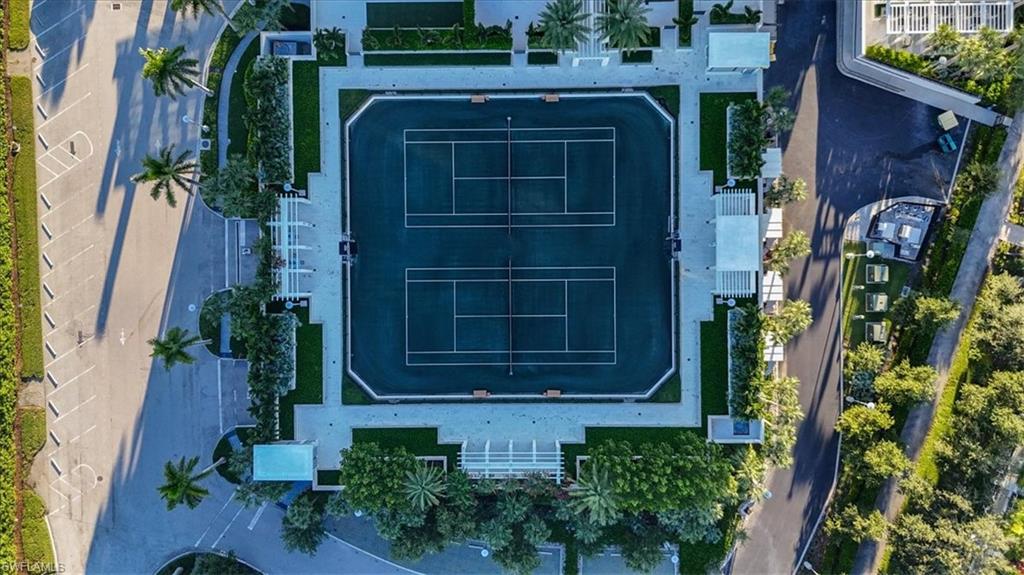 6897 Grenadier Boulevard, Unit 1701 Naples, FL 34108 - Photo 47 of 50 a front view of a house with a yard