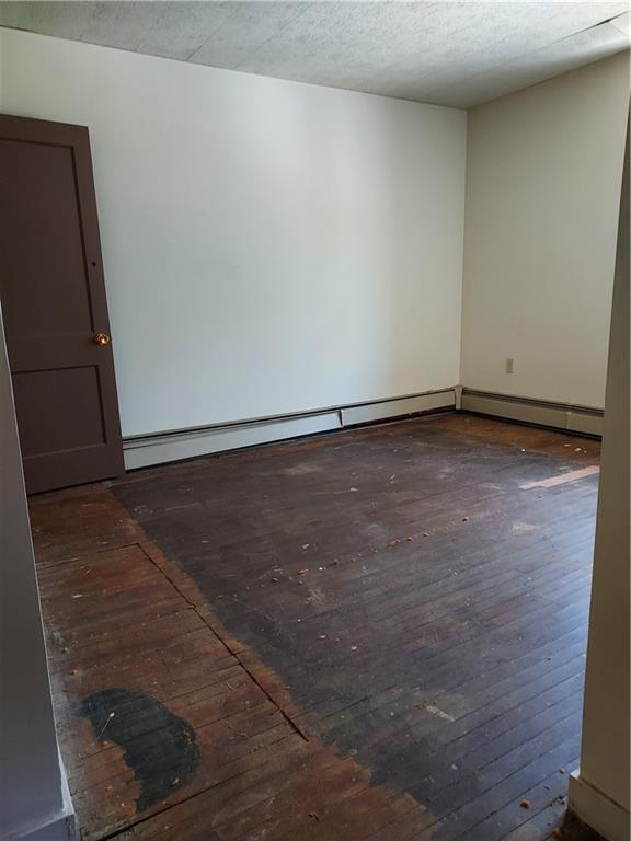 14 Wainwright Avenue Pittsburgh, PA 15227 - Photo 20 of 30 a view of an empty room with wooden floor