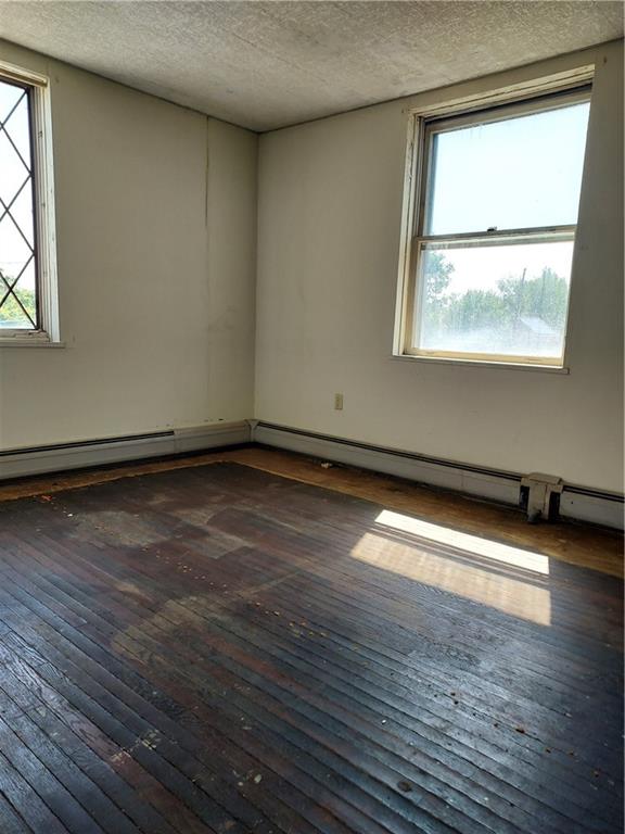 14 Wainwright Avenue Pittsburgh, PA 15227 - Photo 21 of 30 an empty room with wooden floor and windows