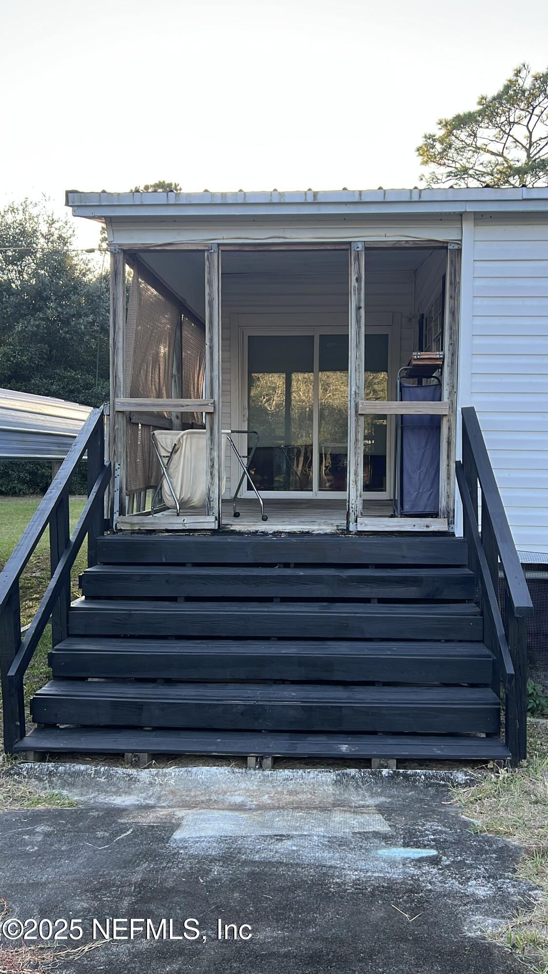 85182 Lonnie Crews Road Fernandina Beach, FL 32034 - Photo 12 of 15 a view of entryway with a front door