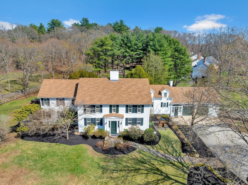 505 Essex Street Hamilton, MA 01982 - Photo 30 of 37 a aerial view of a house with swimming pool garden and patio