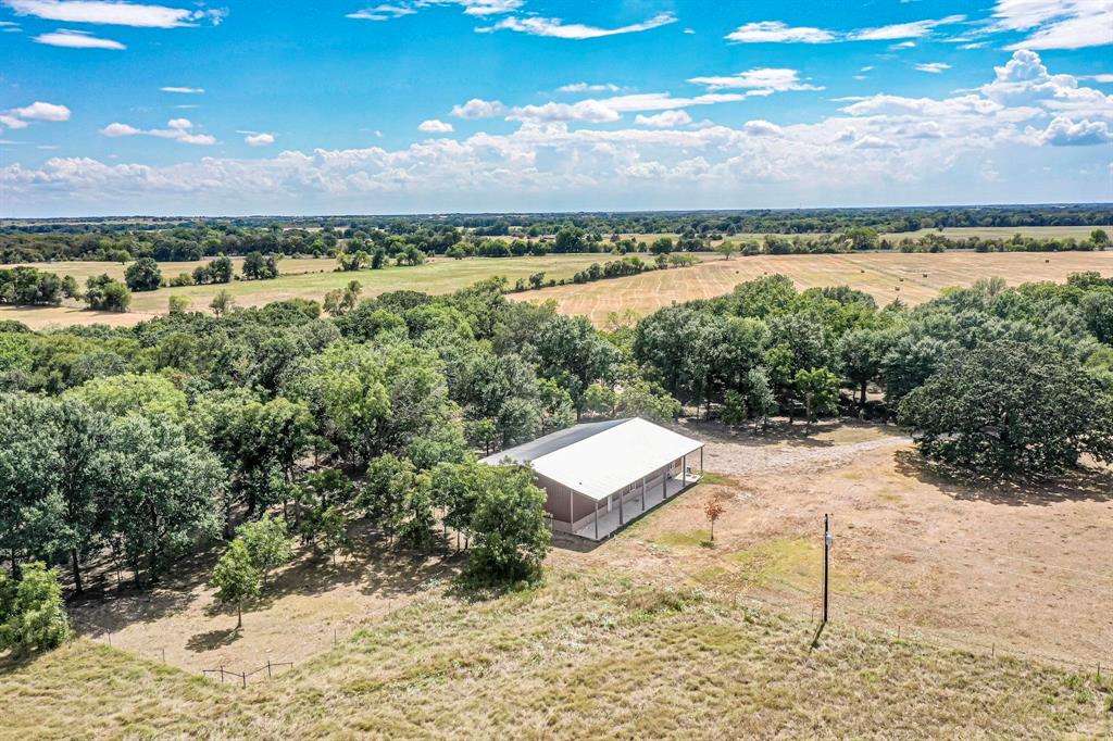 637 Lyman T Davis Road Corsicana, TX 75110 - Photo 15 of 34 a view of a lake with a beach