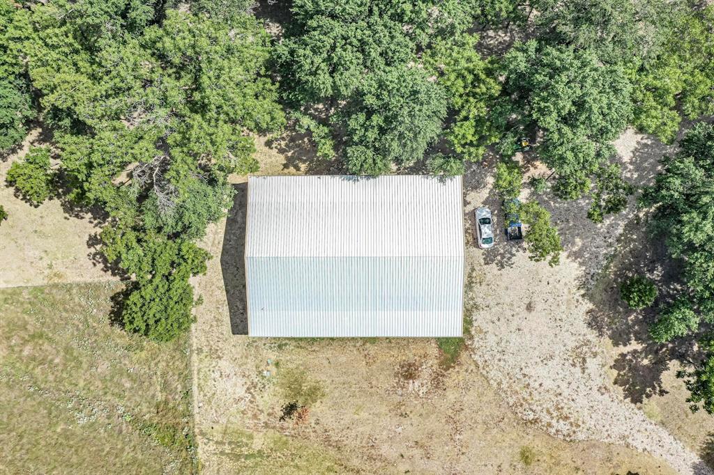 637 Lyman T Davis Road Corsicana, TX 75110 - Photo 17 of 34 a view of a tree with a yard