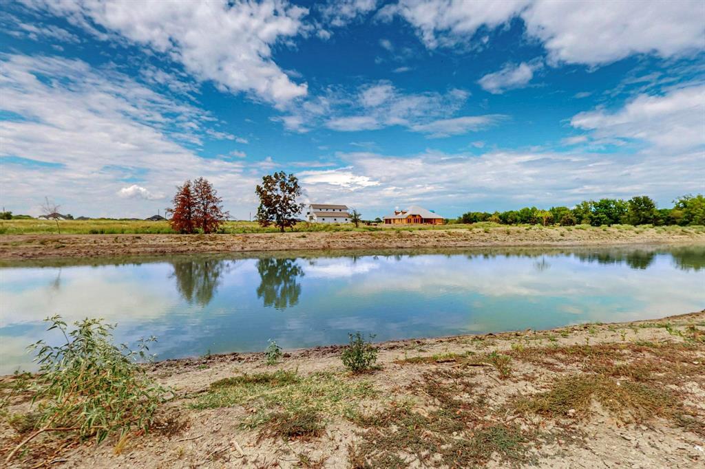 637 Lyman T Davis Road Corsicana, TX 75110 - Photo 18 of 34 a view of a lake with a big yard