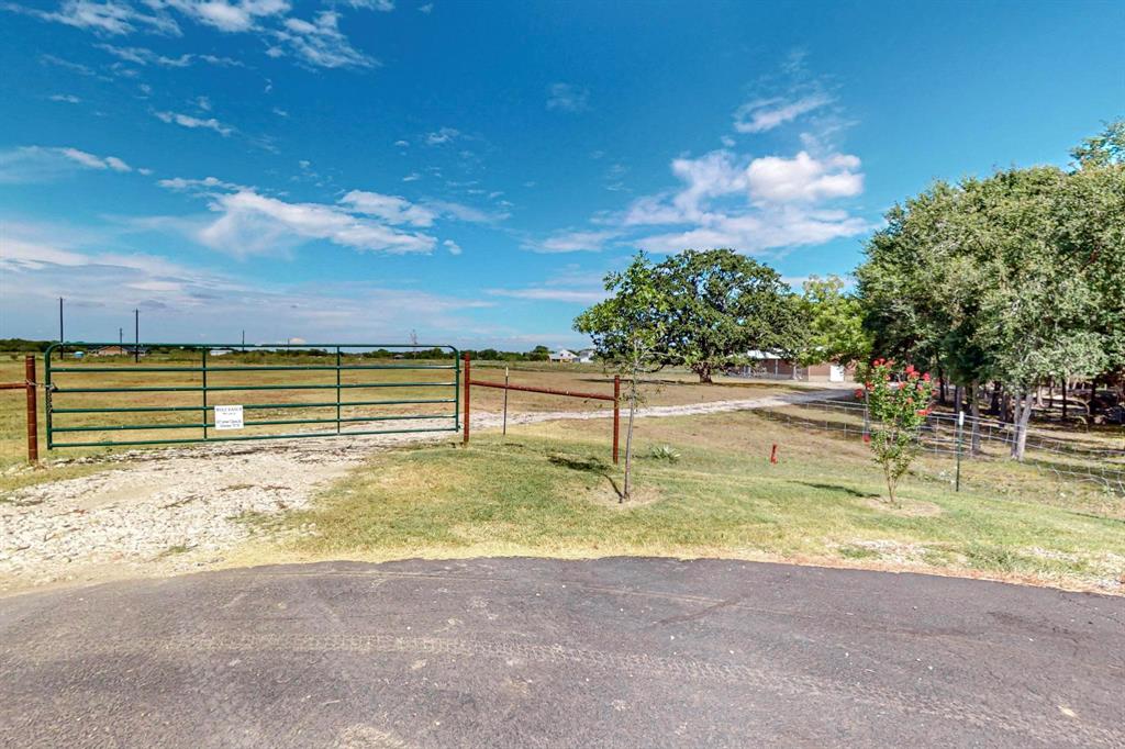 637 Lyman T Davis Road Corsicana, TX 75110 - Photo 22 of 34 a view of a swimming pool with an outdoor seating