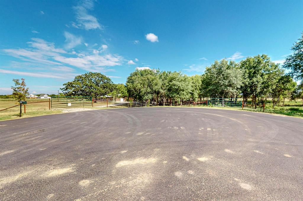 637 Lyman T Davis Road Corsicana, TX 75110 - Photo 25 of 34 a view of a big yard with an trees