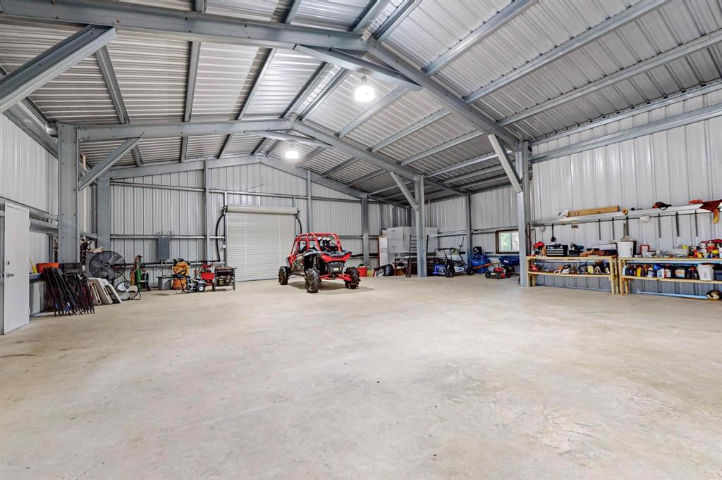 637 Lyman T Davis Road Corsicana, TX 75110 - Photo 30 of 34 a view of a storage area with a bike
