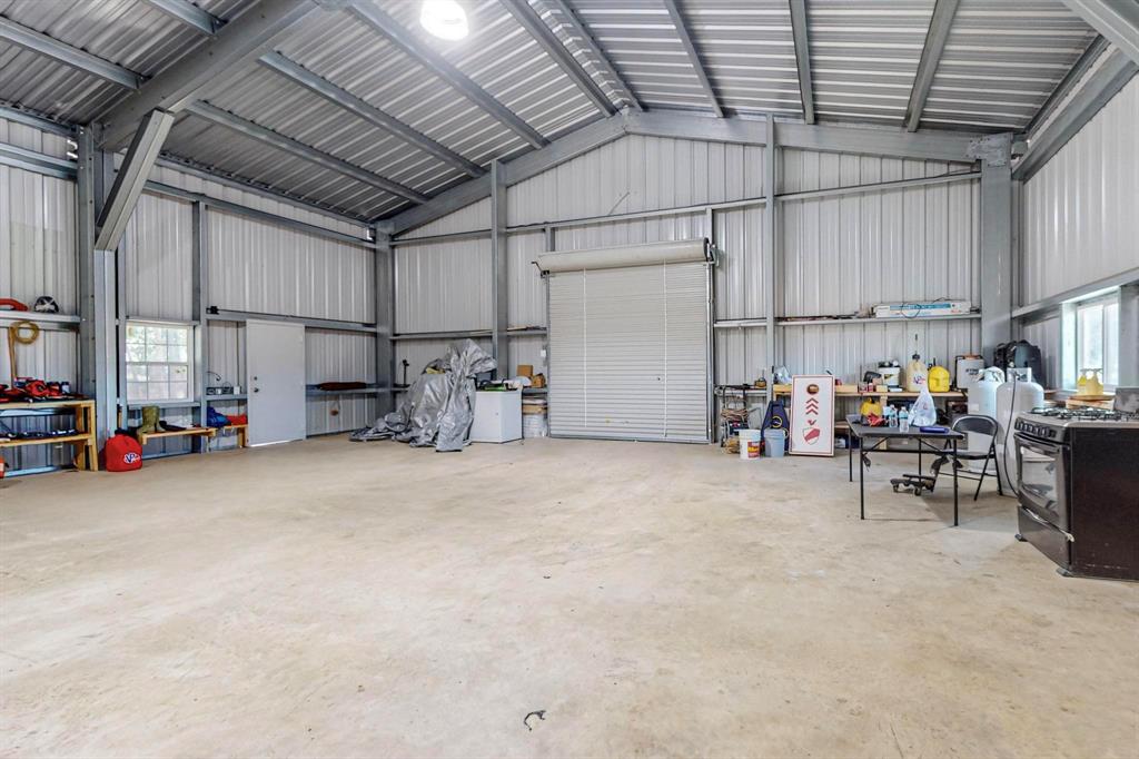 637 Lyman T Davis Road Corsicana, TX 75110 - Photo 31 of 34 a view of storage and utility room