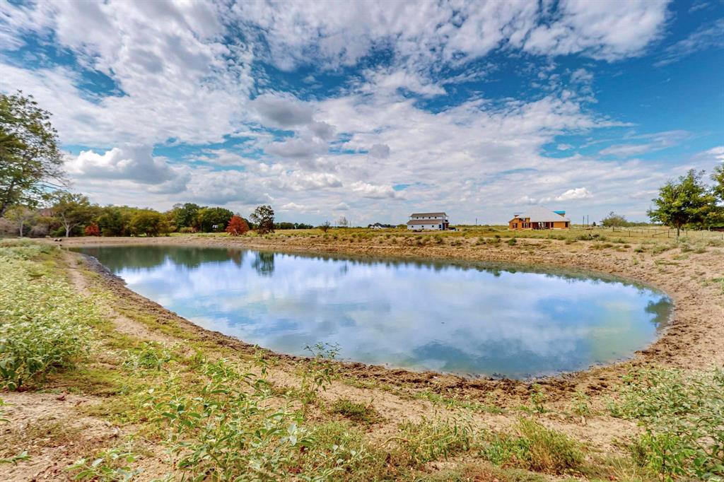 637 Lyman T Davis Road Corsicana, TX 75110 - Photo 8 of 34 a view of a lake with a yard