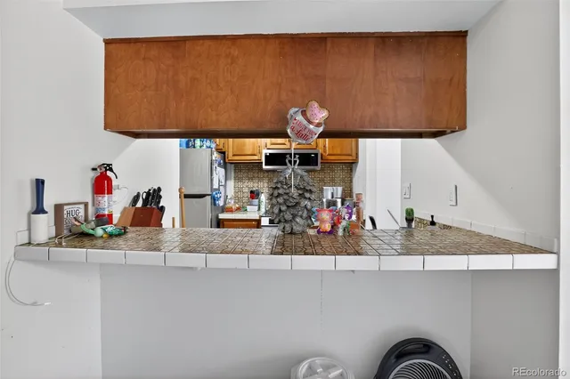 a room with a sink and a mirror