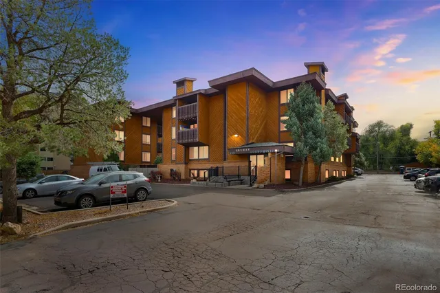 a view of a street with cars