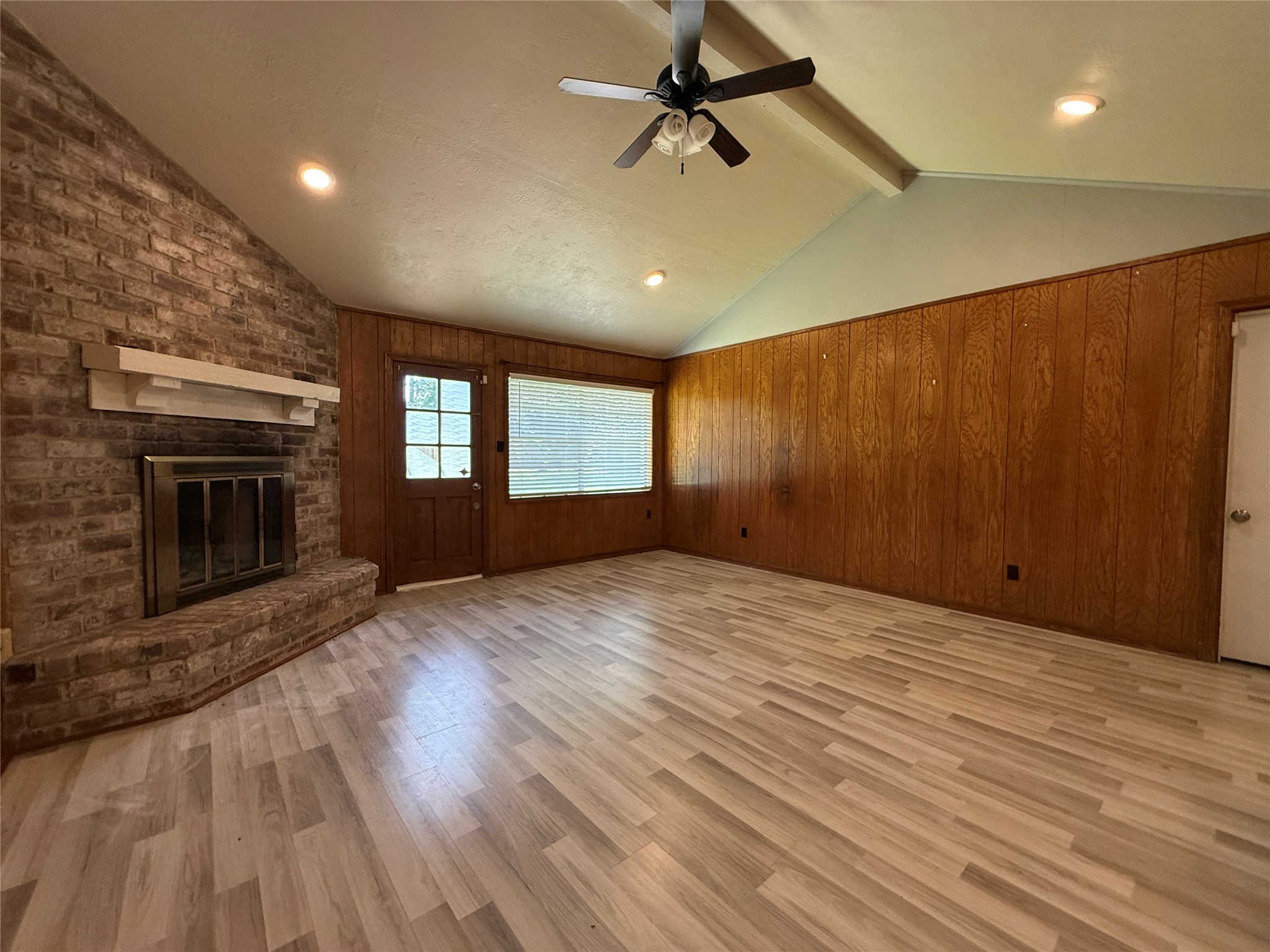 422 Gamewood Drive Spring, TX 77386 - Photo 10 of 25 an empty room with windows and fireplace