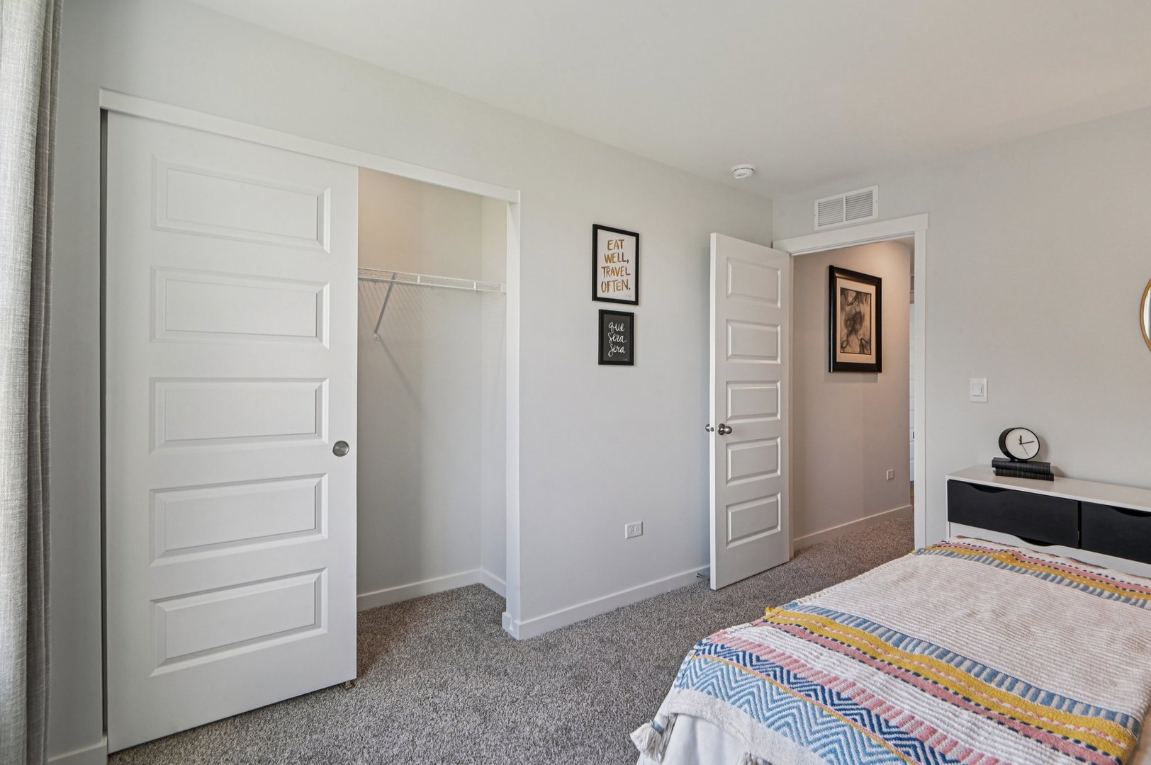 2560 Tahoe Lane Pingree Grove, IL 60140 - Photo 22 of 50 a bedroom with a bed and a cabinets