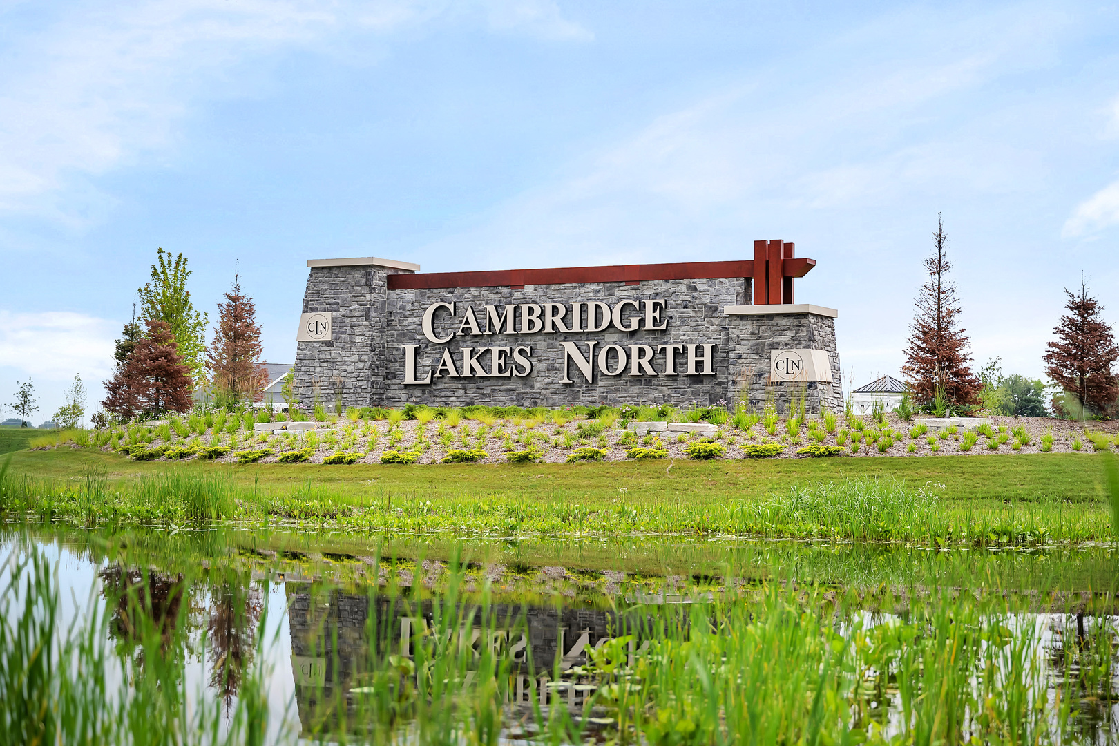 2560 Tahoe Lane Pingree Grove, IL 60140 - Photo 29 of 50 a sign of golf club on a wall under a large tree