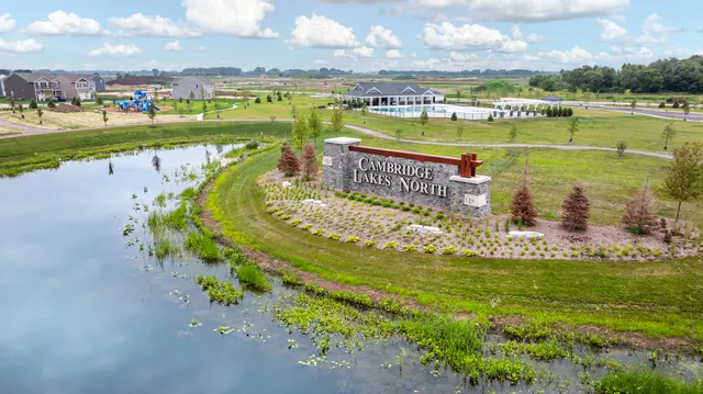 a view of a house with a yard porch and sitting area