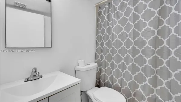 a bathroom with a sink and a toilet