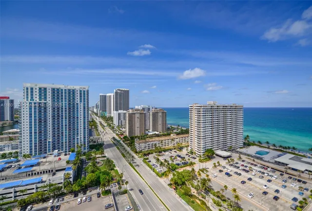 a view of a city with tall buildings