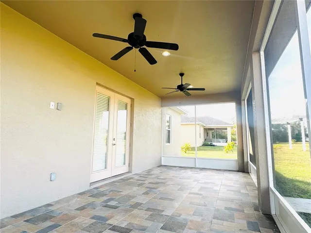 a view of an empty room and window