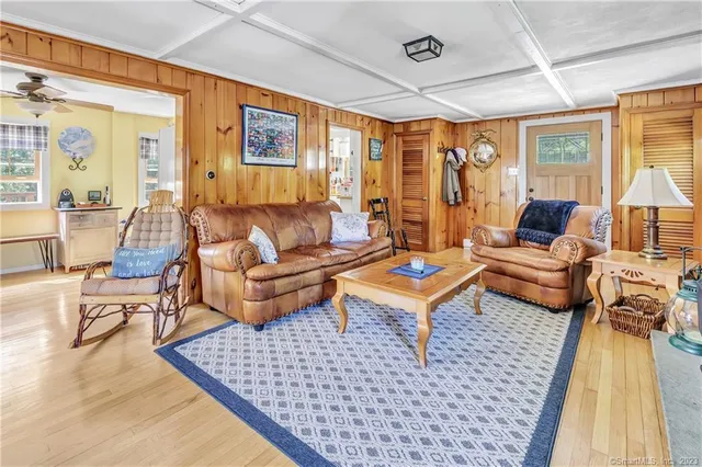 a living room with furniture and a rug